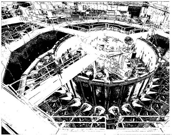 This is the top view of a particle accelerator, or atom smasher. The instrument has been used to convert very small particles and atoms into new elements, such as californium. The magnets in the accelerator consist of boron alloys.