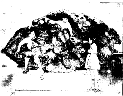 Some meteorites are very rich in iron. Here, children play on the Williamette meteorite in Hayden Planetarium in New York City, in 1939.