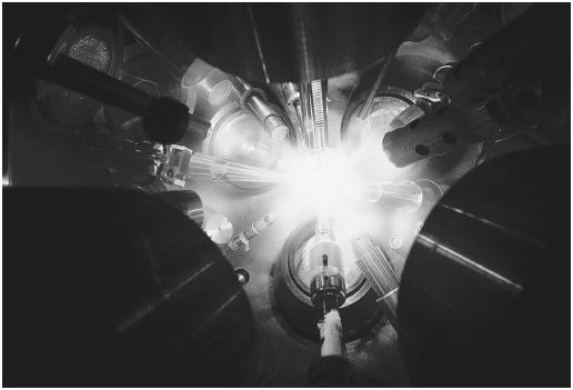 Lasers focus on a small pellet of fuel in attempt to create a nuclear fusion reaction (the combination of two nuclei to produce another nucleus) for the purpose of producing energy.