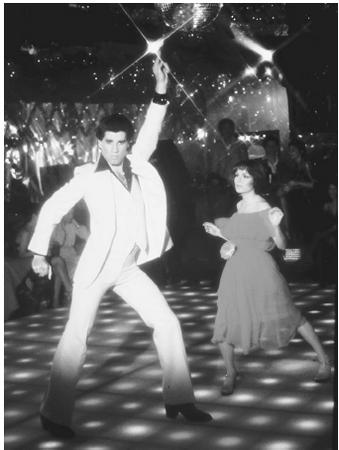 John Travolta and Karen Lynn Gorney in the 1970s hit film Saturday Night Fever. Polyester was a popular fabric used in clothing in the 1970s.