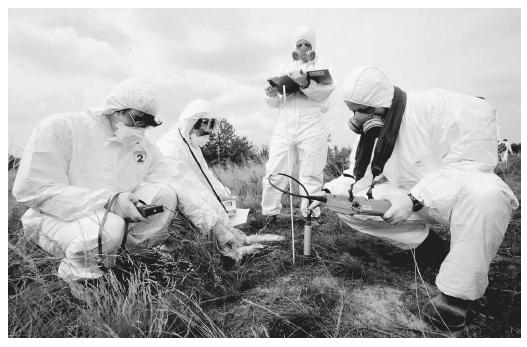 These radiologists are measuring radioactivity levels in the soil near the Chernobyl nuclear plant, Ukraine.