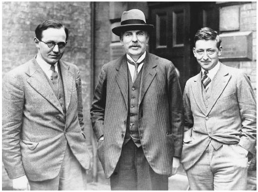 British physicist Ernest Rutherford (middle), recipient of the 1908 Nobel Prize in chemistry, "for his investigations into the disintegration of the elements, and the chemistry of radioactive substances."