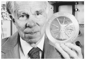 American chemist Glenn Theodore Seaborg, corecipient with Edwin Mattison McMillan of the 1951 Nobel Prize in chemistry, "for their discoveries in the chemistry of the transuranium elements." Here, Seaborg holds a container of samples of the radioactive elements 94 through 102.